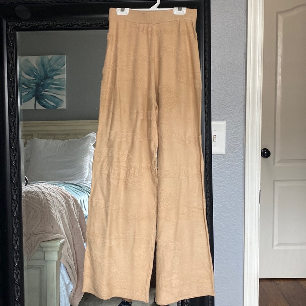 Tan lounge pants, with texture detailing